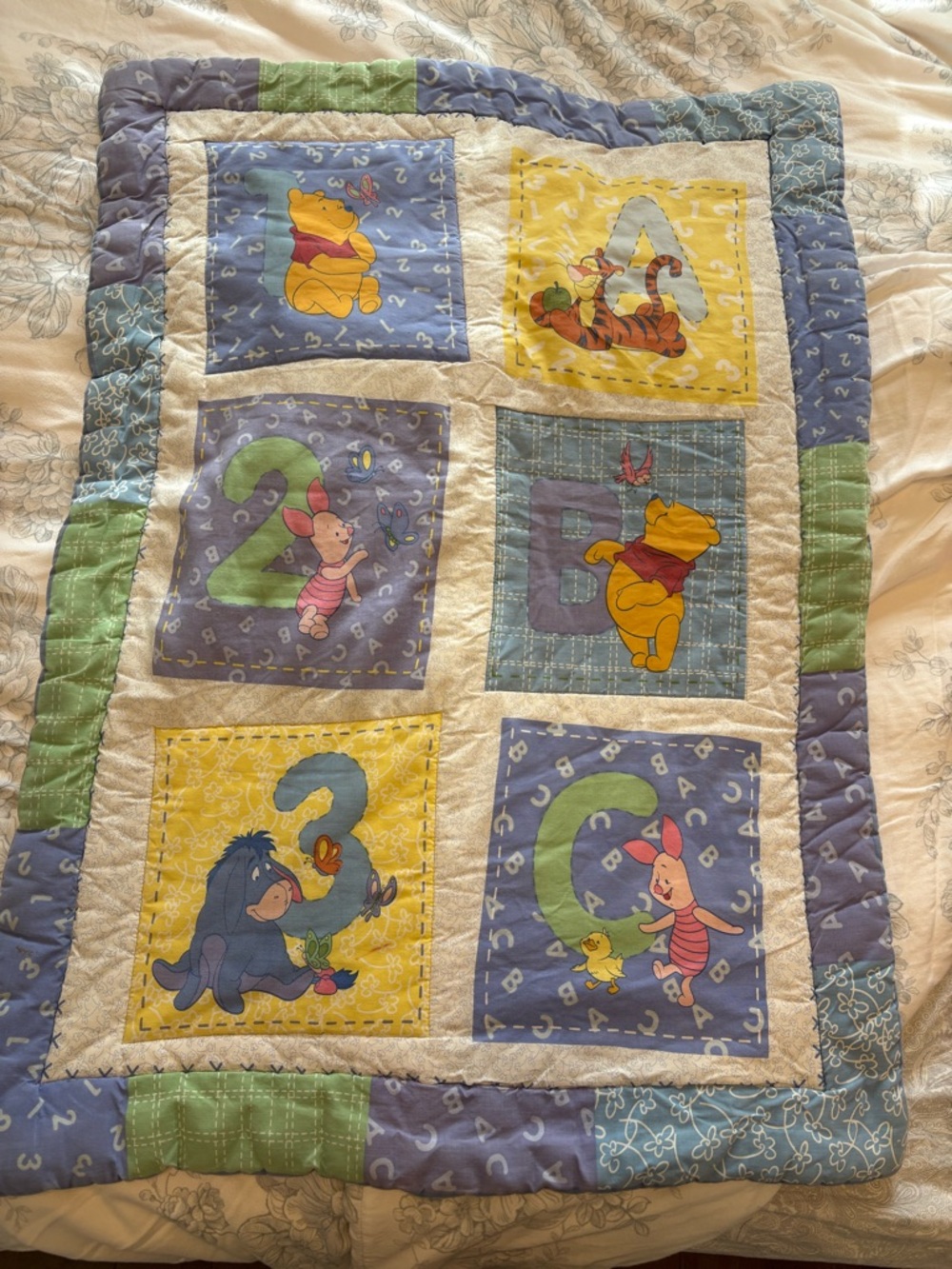Disney Winnie the Pooh Patchwork Quilt - Blue, Yellow, Green